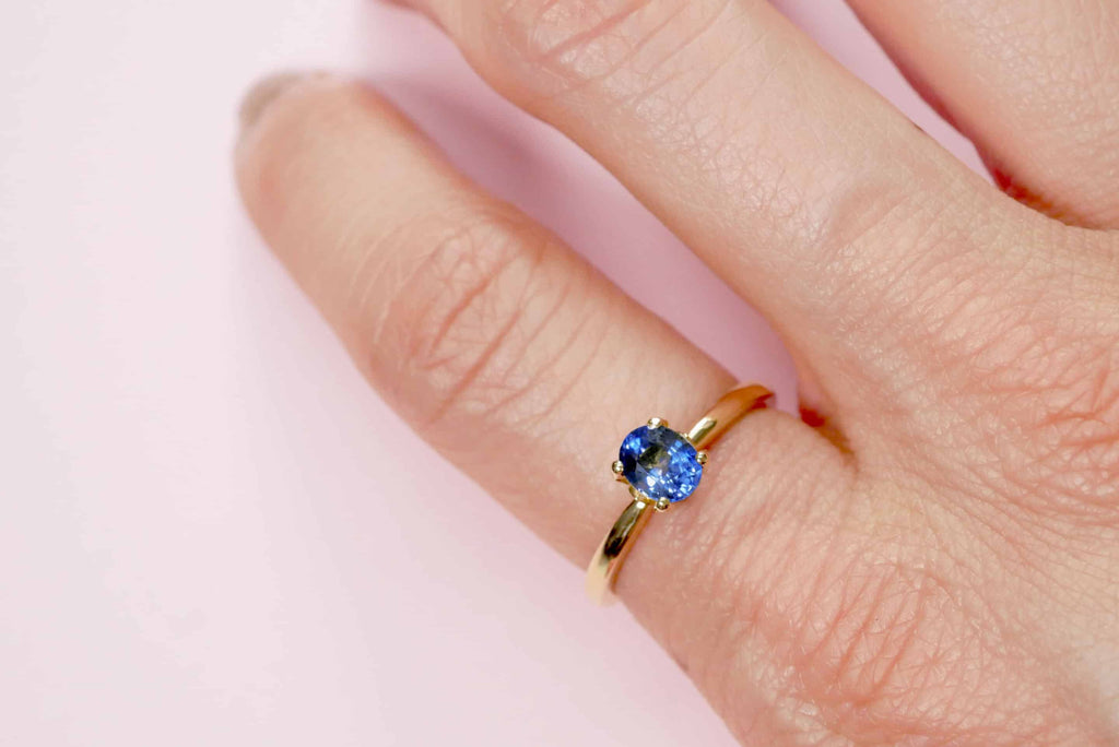 Solitaire Ring: Icy Blue Sapphire Ring in 18k Yellow Gold